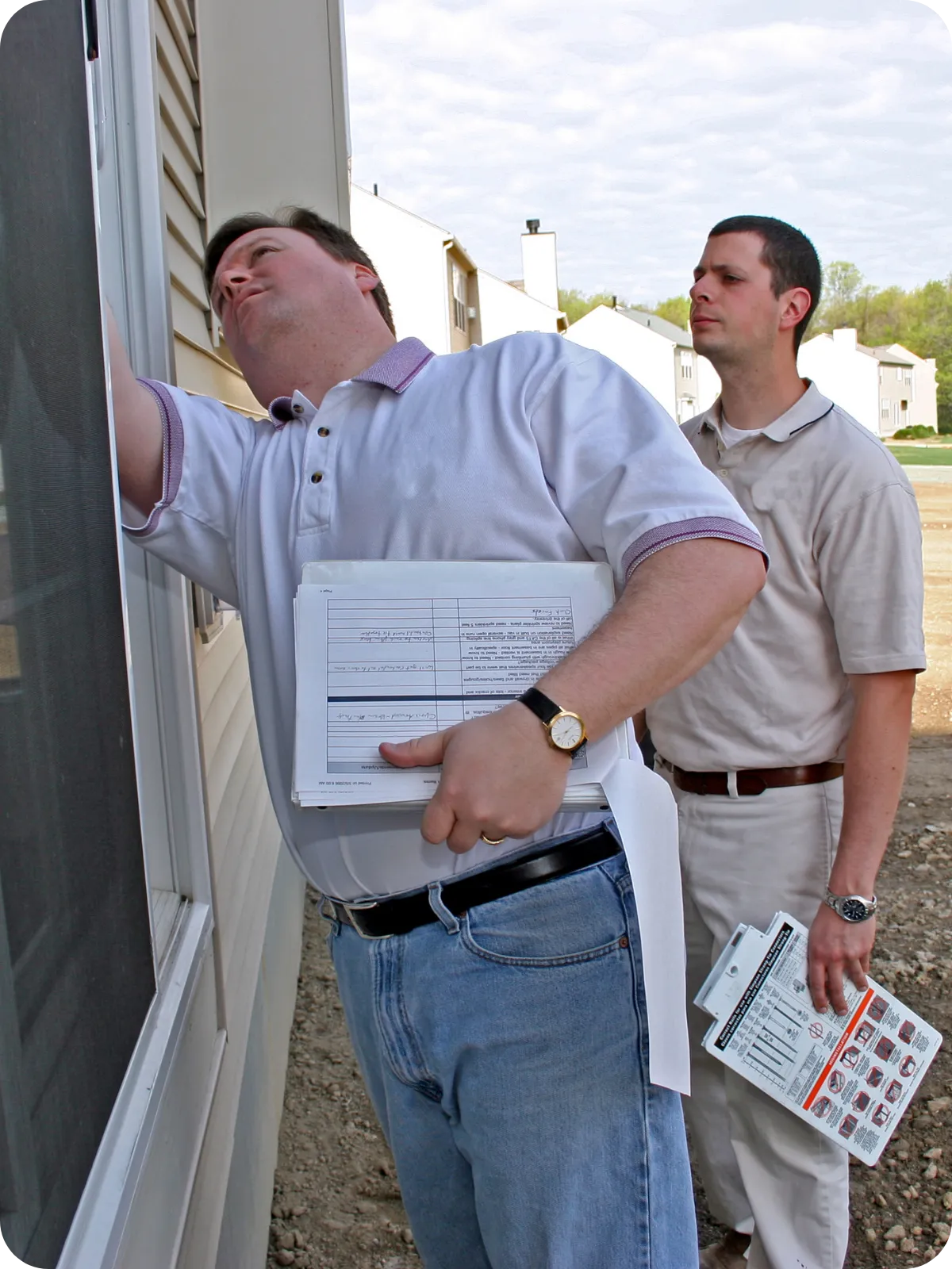 Certified home inspectors in Charlotte, NC performing exterior home inspection | Charlotte Home Inspector Pros