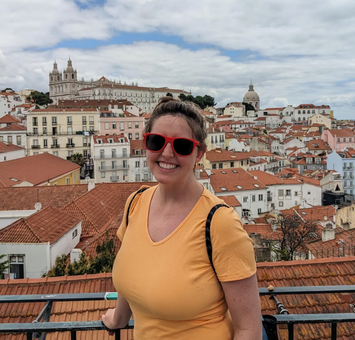 Tara with the old city of lisbon in the background