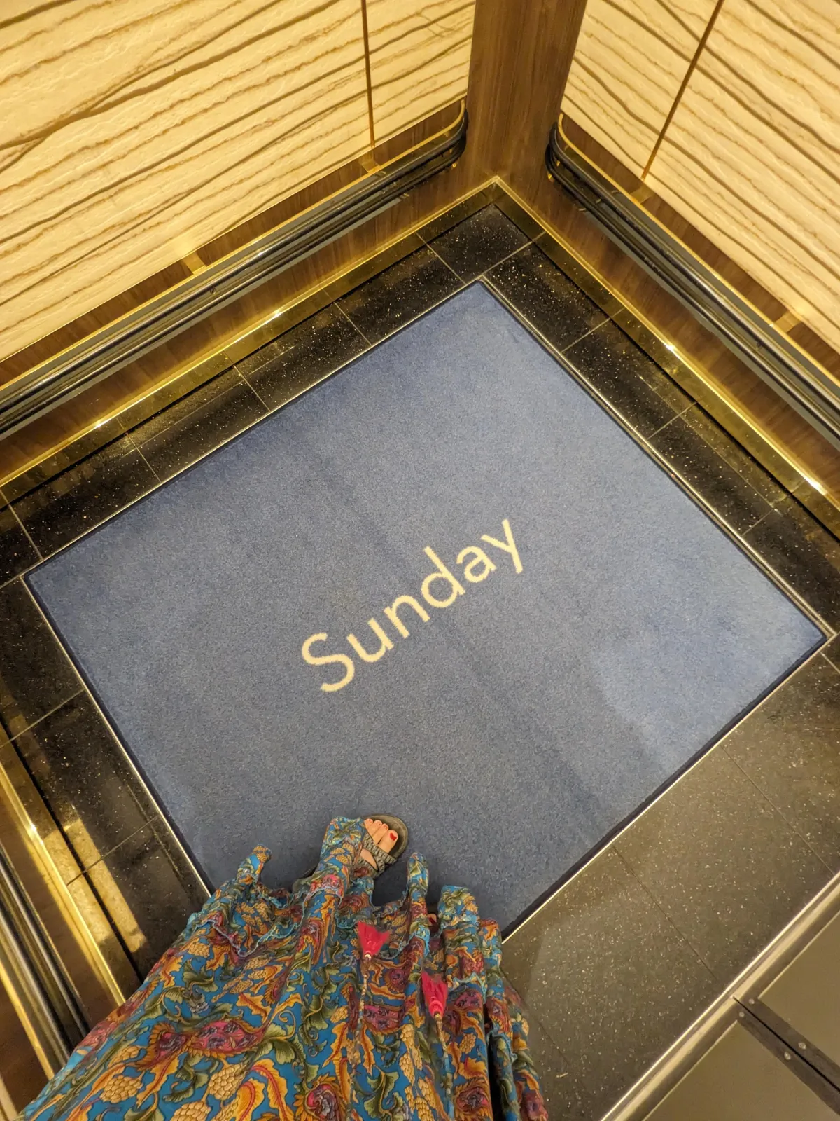 They had a rug in the elevator with the day of the week - here's Sunday