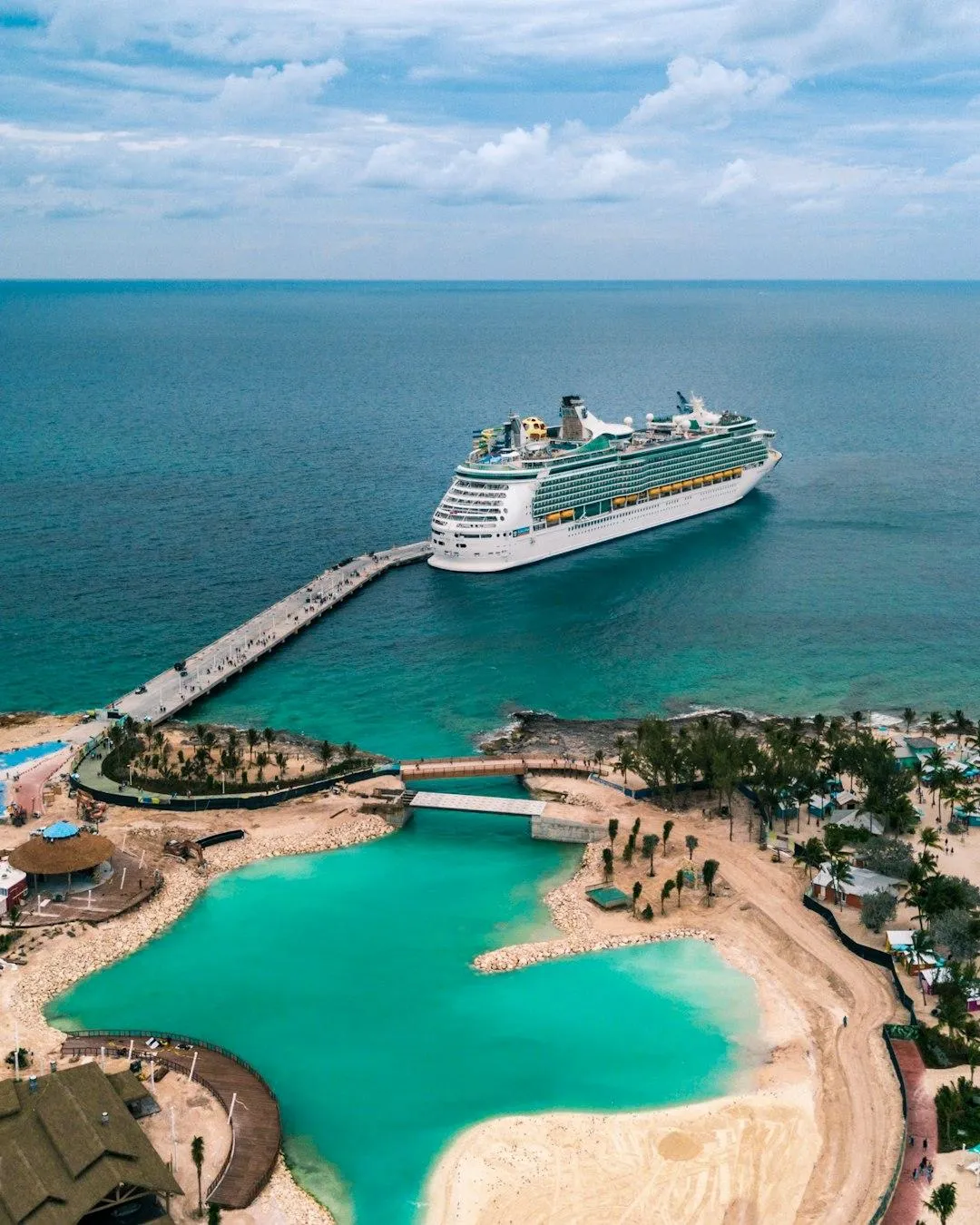 A cruise ship docking at a private island