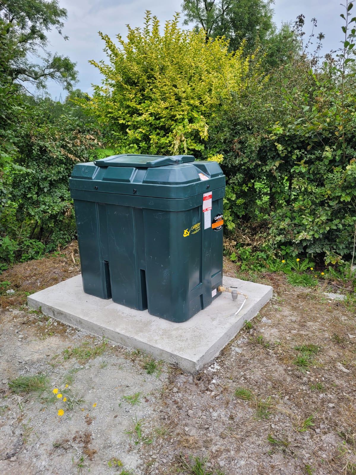 New oil tank installation outside a Leitrim home by DML Plumbing and Heating