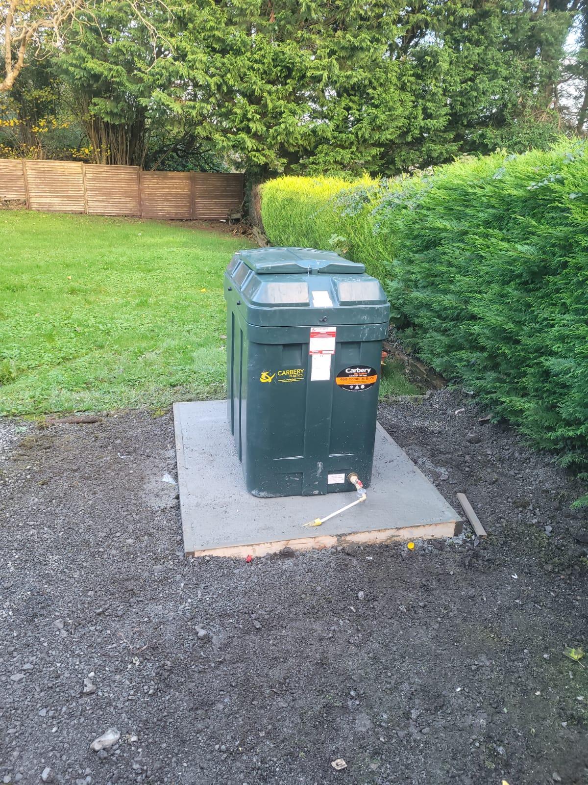 Domestic oil tank installation outside a Leitrim home by DML Plumbing and Heating