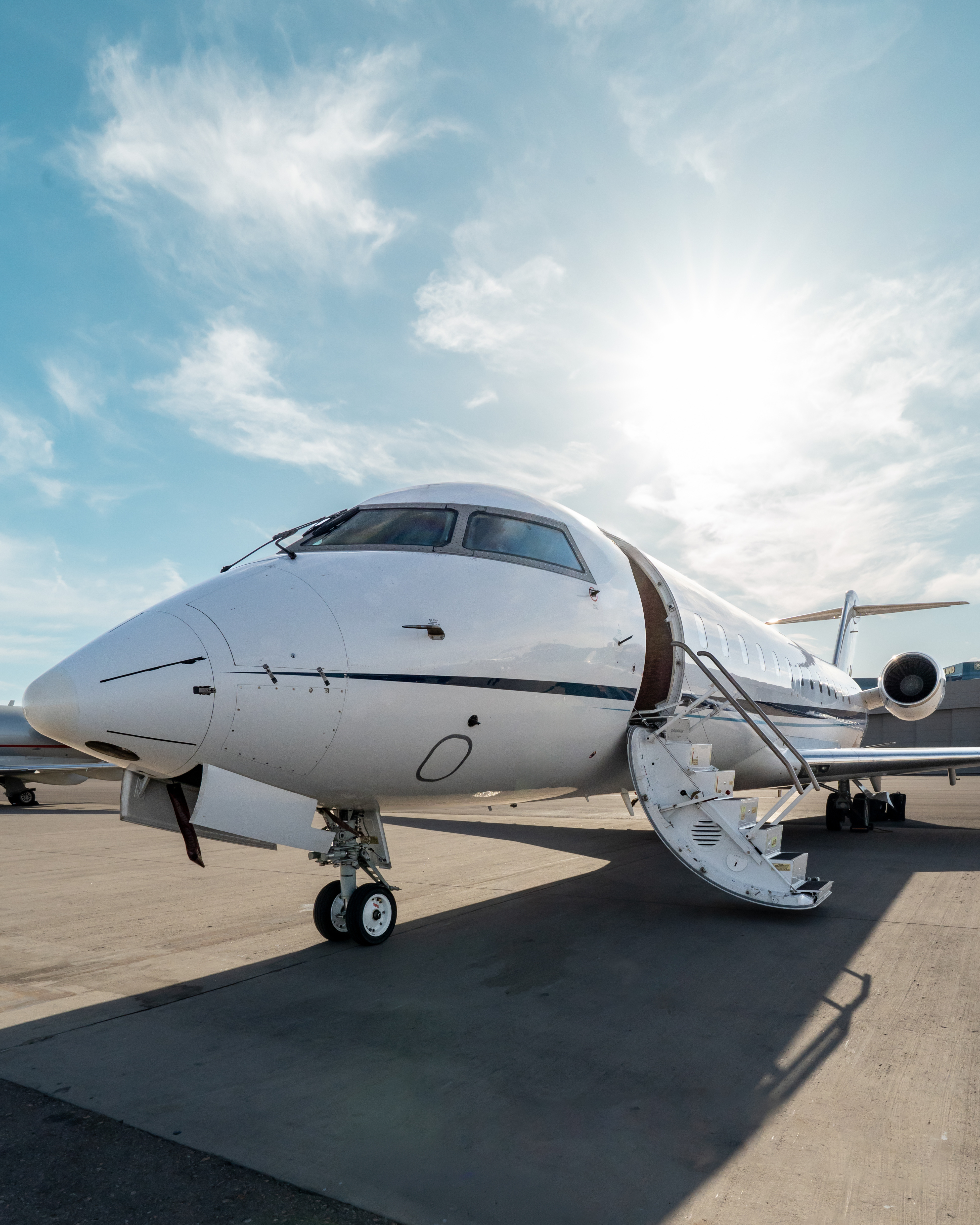 Private jet in a dimly lit hangar