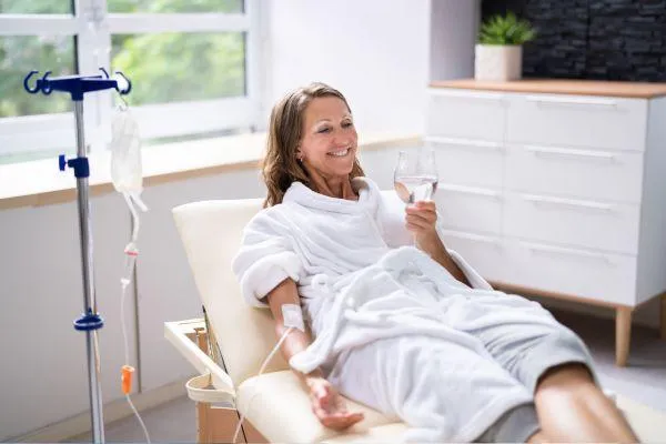 Woman getting IV Exosomes