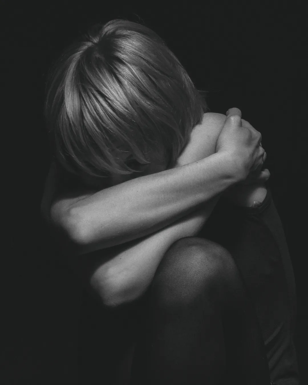 woman holding brown umbrella