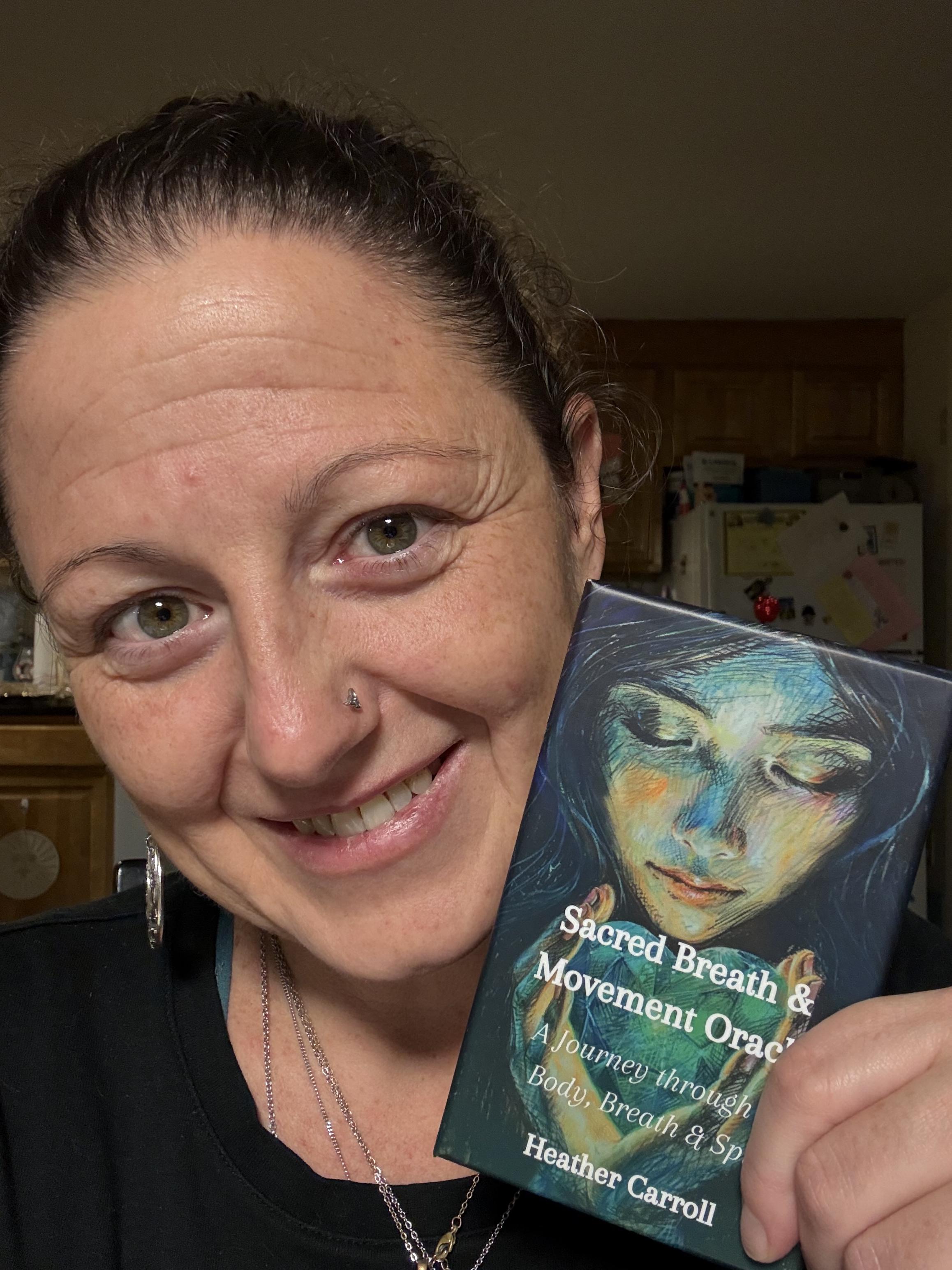 persons hand with white manicure