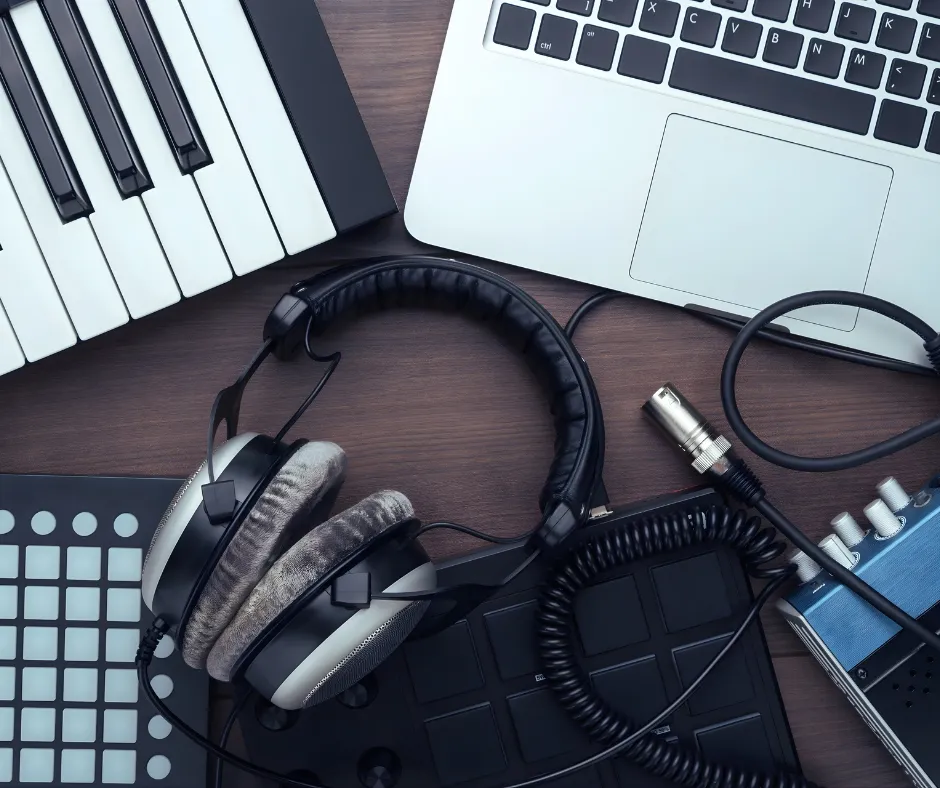 woman in white long sleeve shirt using black laptop computer
