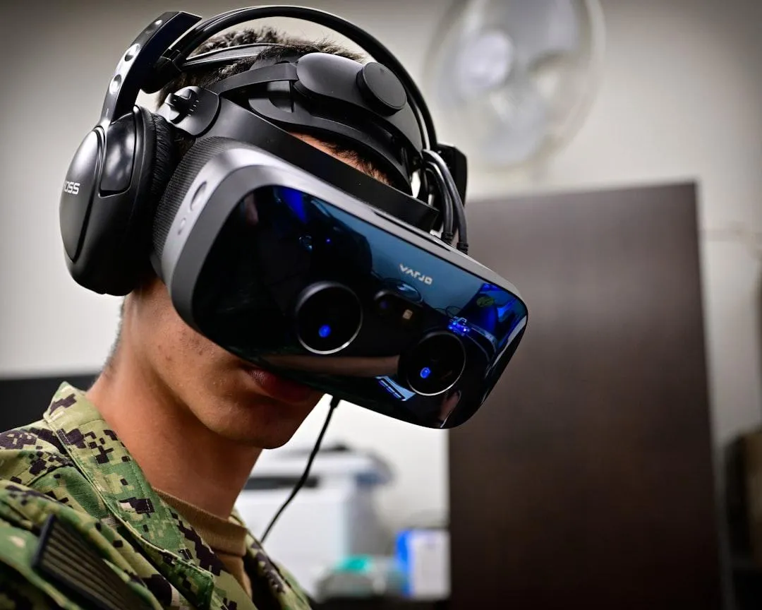Student with headset and VR googles on.