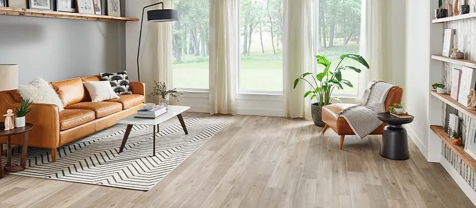 A wooden floor with a rug on top of it