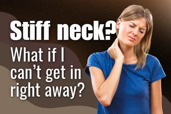 Woman holding her neck after waking up with a stiff neck