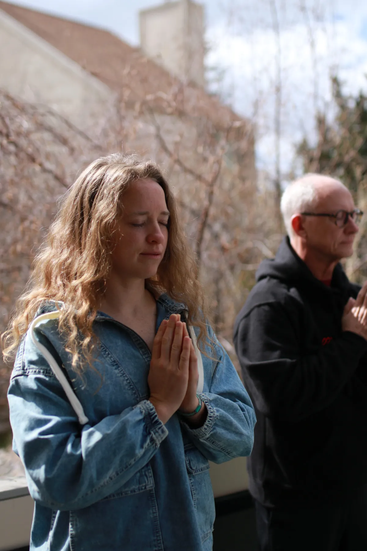 a person holding a sign that says new empowering stories