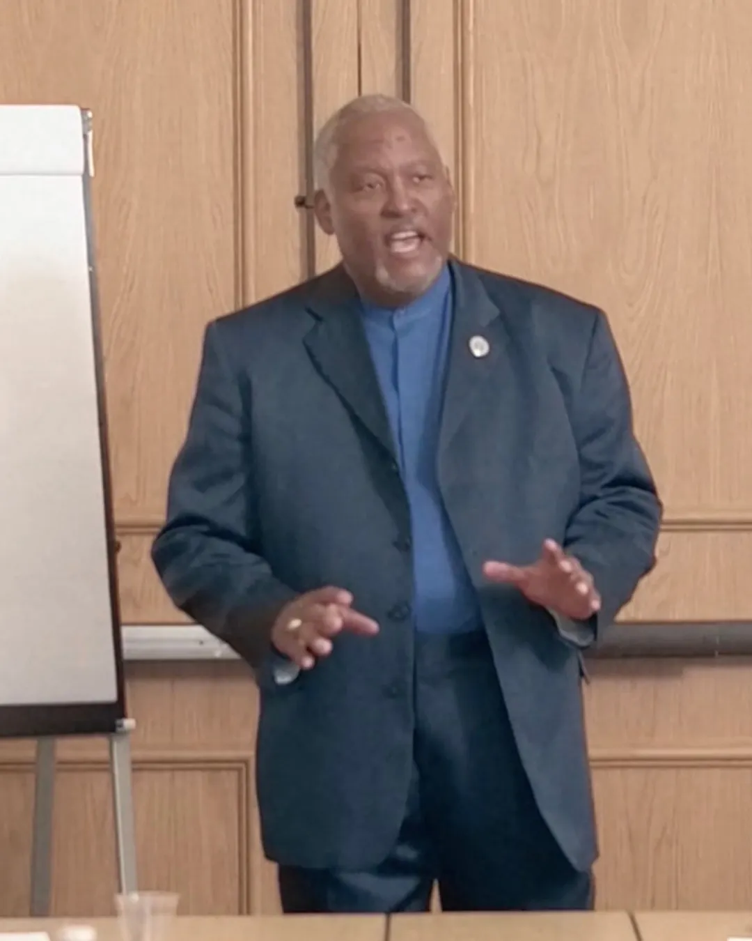 Stan Lewis speaking with executive leaders