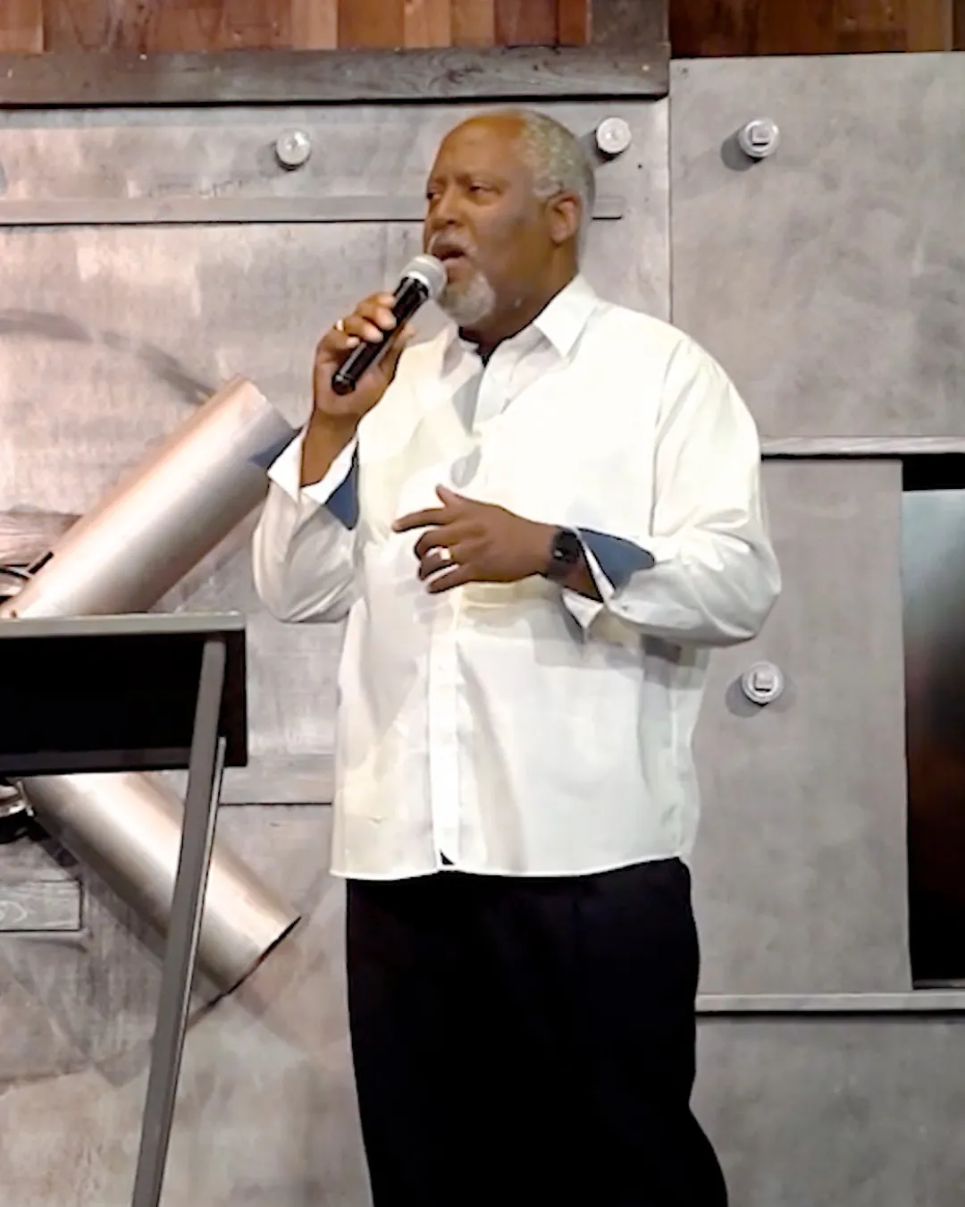 Stan Lewis speaking with executive leaders