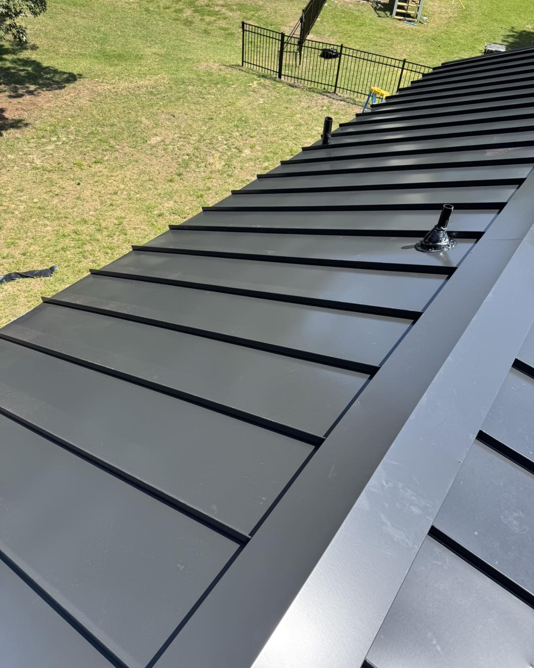 Professional roofer completing a job