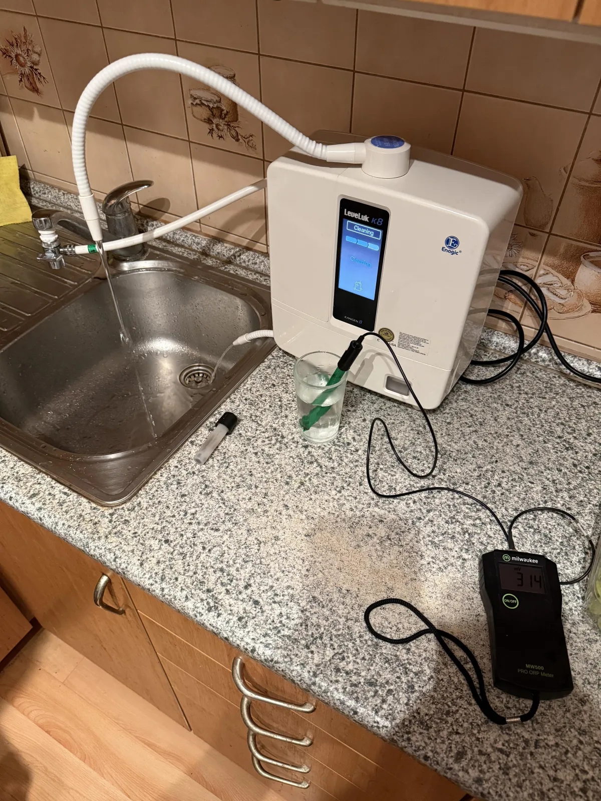 human hand holding plasma ball