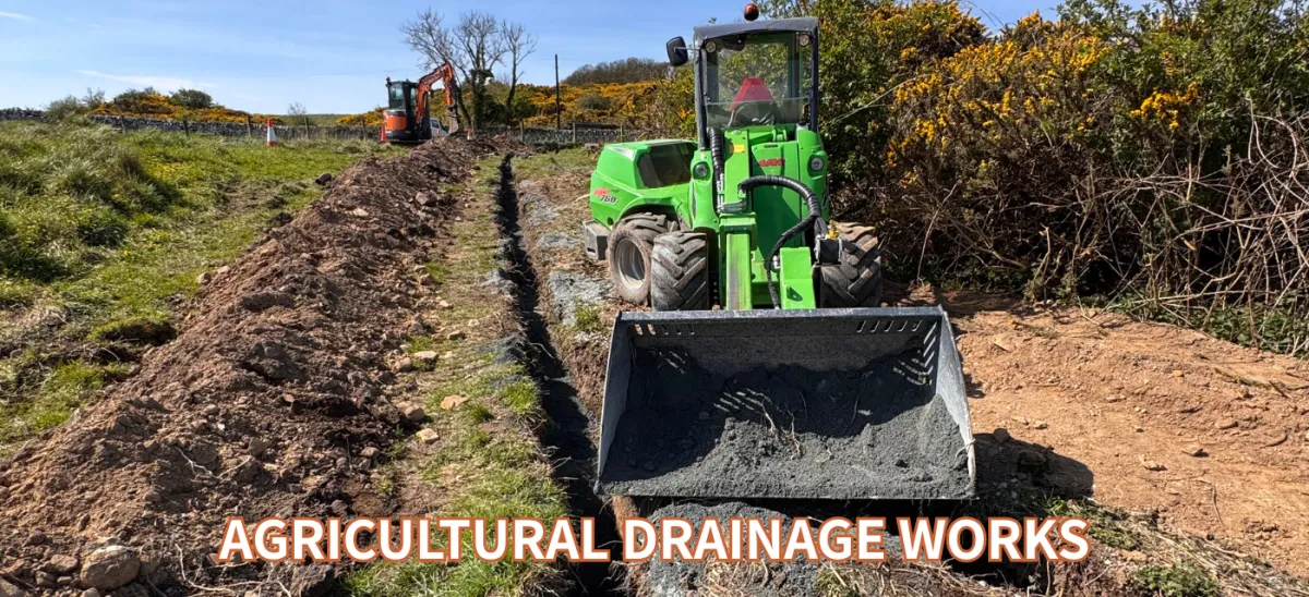 JF Groundworks Avant loader and excavator carrying out agricultural drainage works on rural land in Dumfries and Galloway
