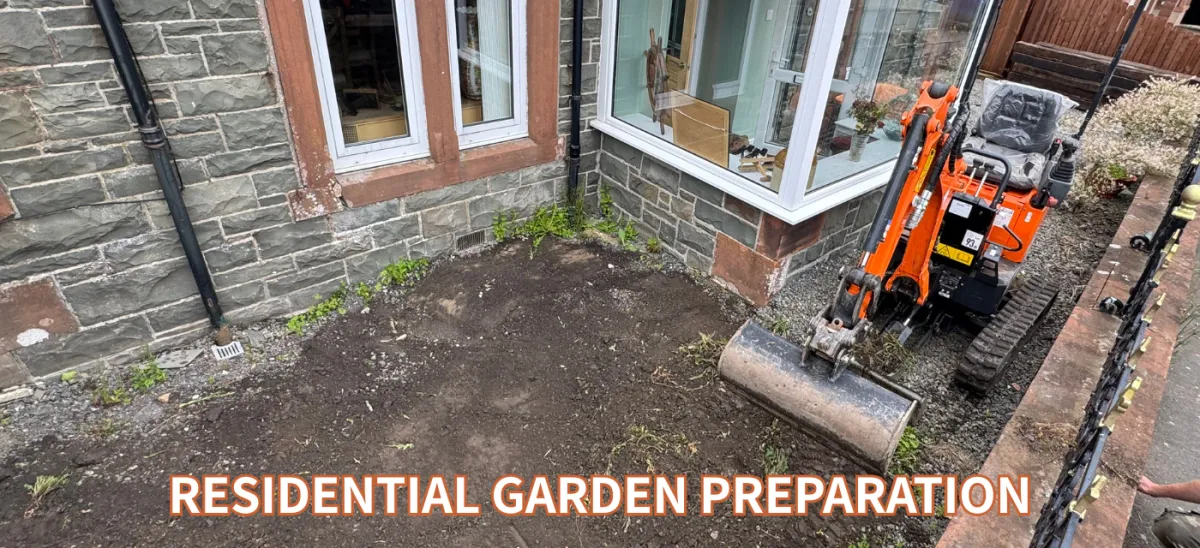JF Groundworks compact excavator preparing a residential garden area for landscaping and outdoor improvements