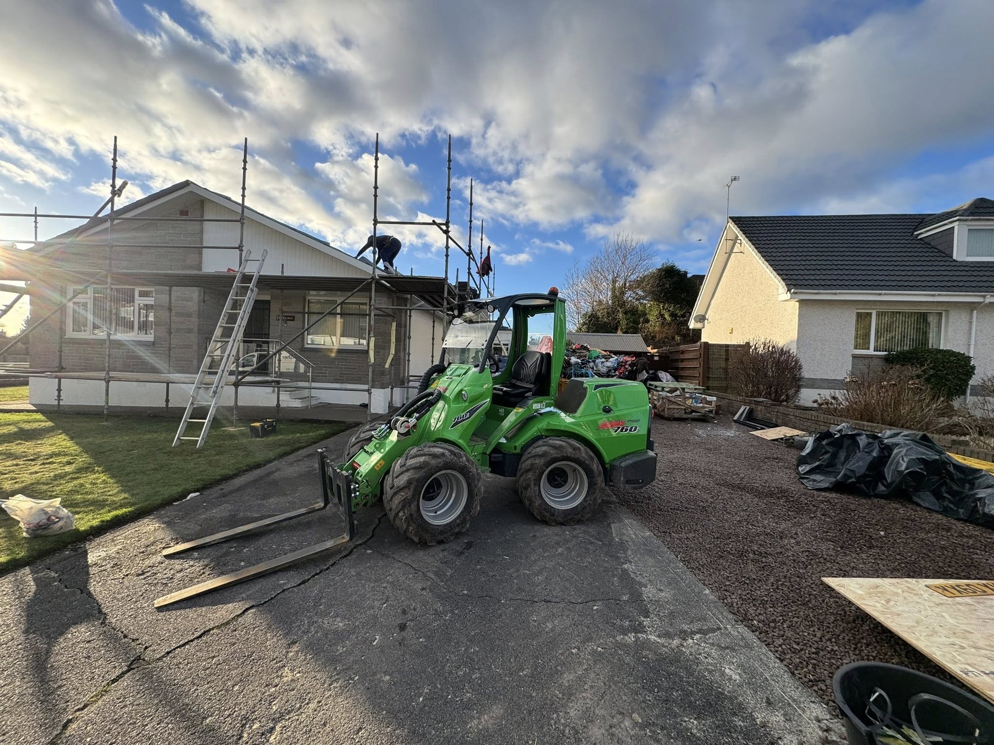 Avant 760i loader supporting a roofing project in Kirkcudbright by JF Groundworks with material handling and site assistance
