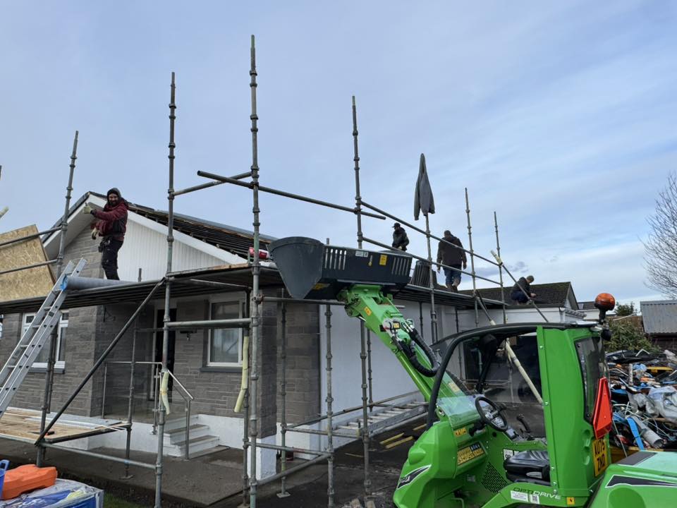 Roofing job assistance in Kirkcudbright by JF Groundworks using the Avant 760i to move materials and support contractors on site