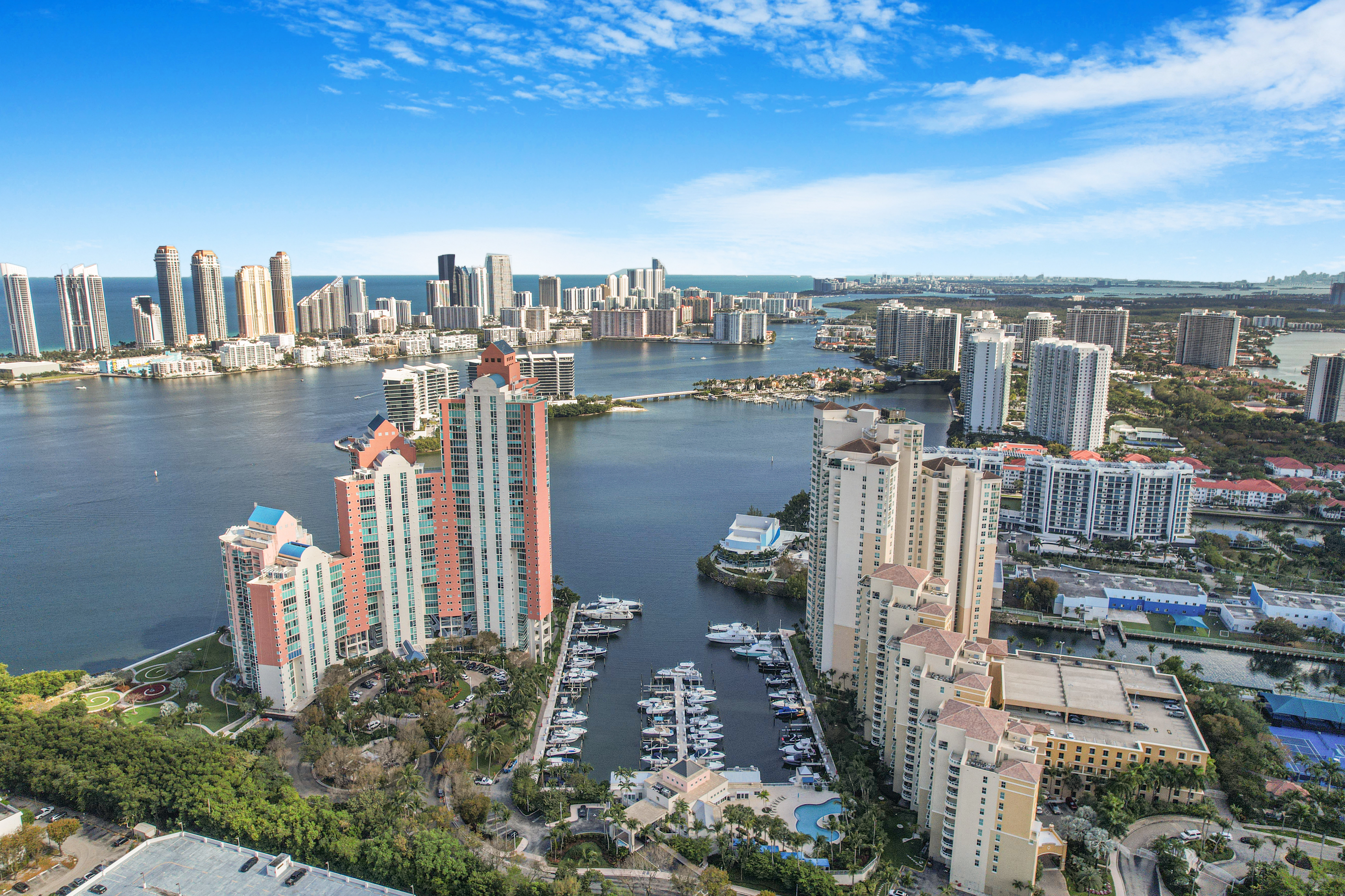 Luxury apartment interior with large windows, ocean view, minimalist decor, Miami style
