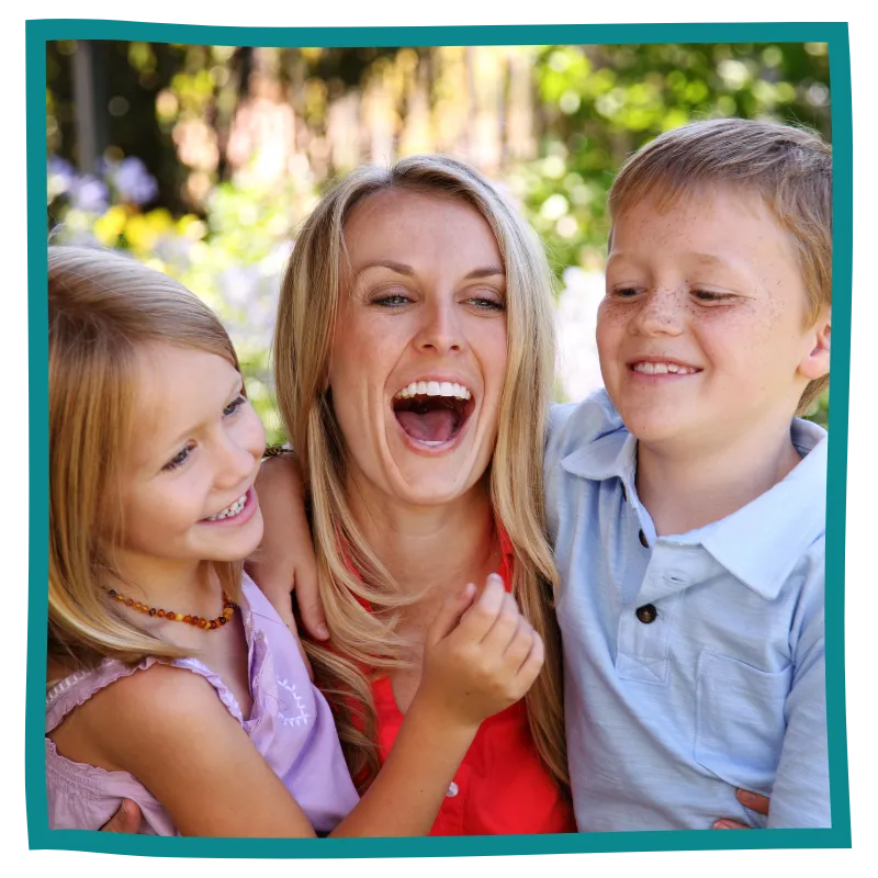 Smiling Mother holding baby