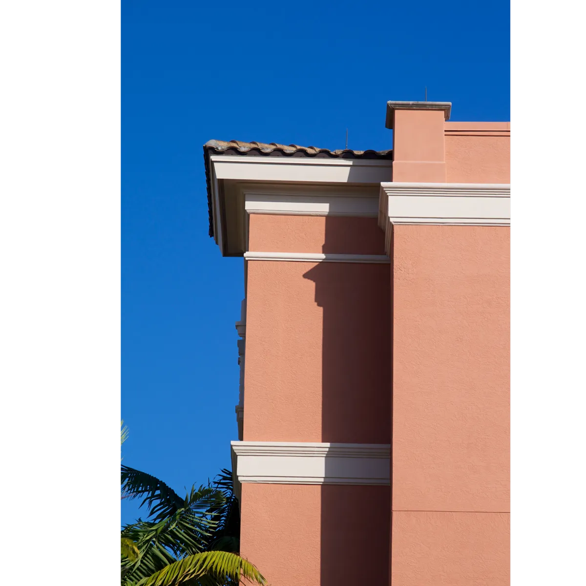 apartment with red stucco exterior 