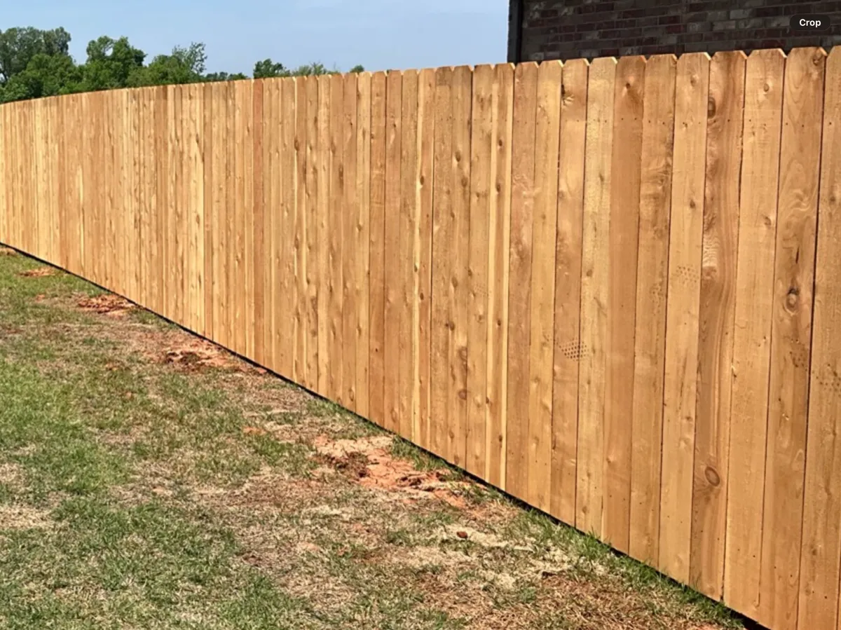 Should a Cedar Fence Touch the Ground? A Guide for Oklahoma City Homeowners