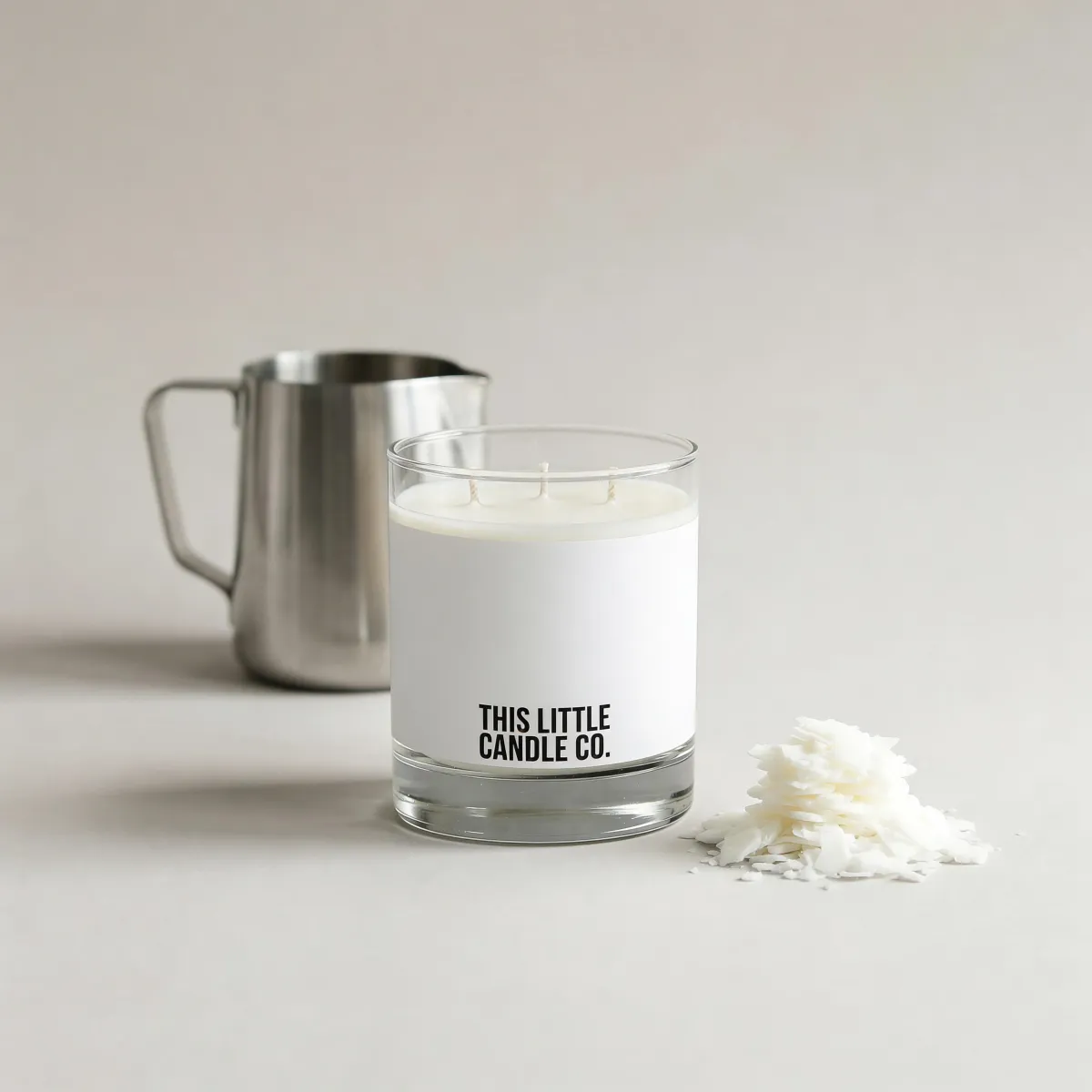 Minimal lab-style fragrance workspace with bottles and droppers