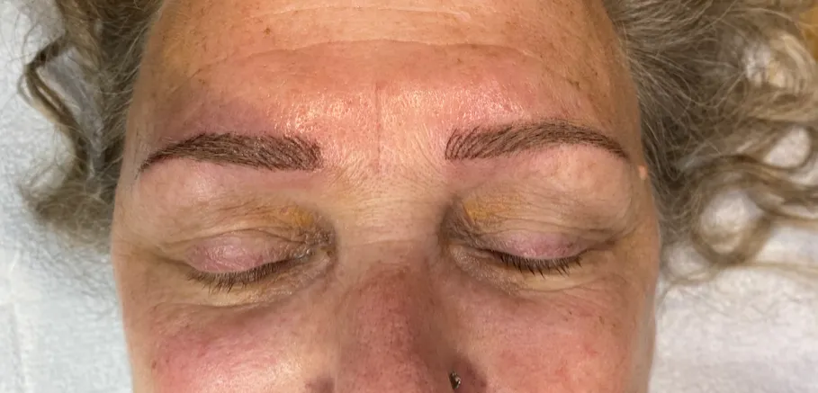 Before tantric tattoo permanent makeup treatment showing natural brows and lash line.