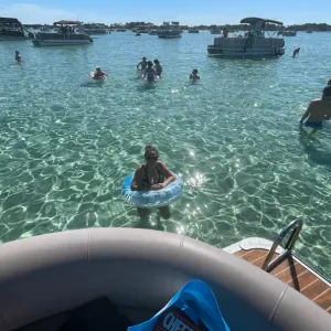 people in the water at crab island