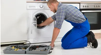 Professional washer repair service restoring a washing machine’s functionality.