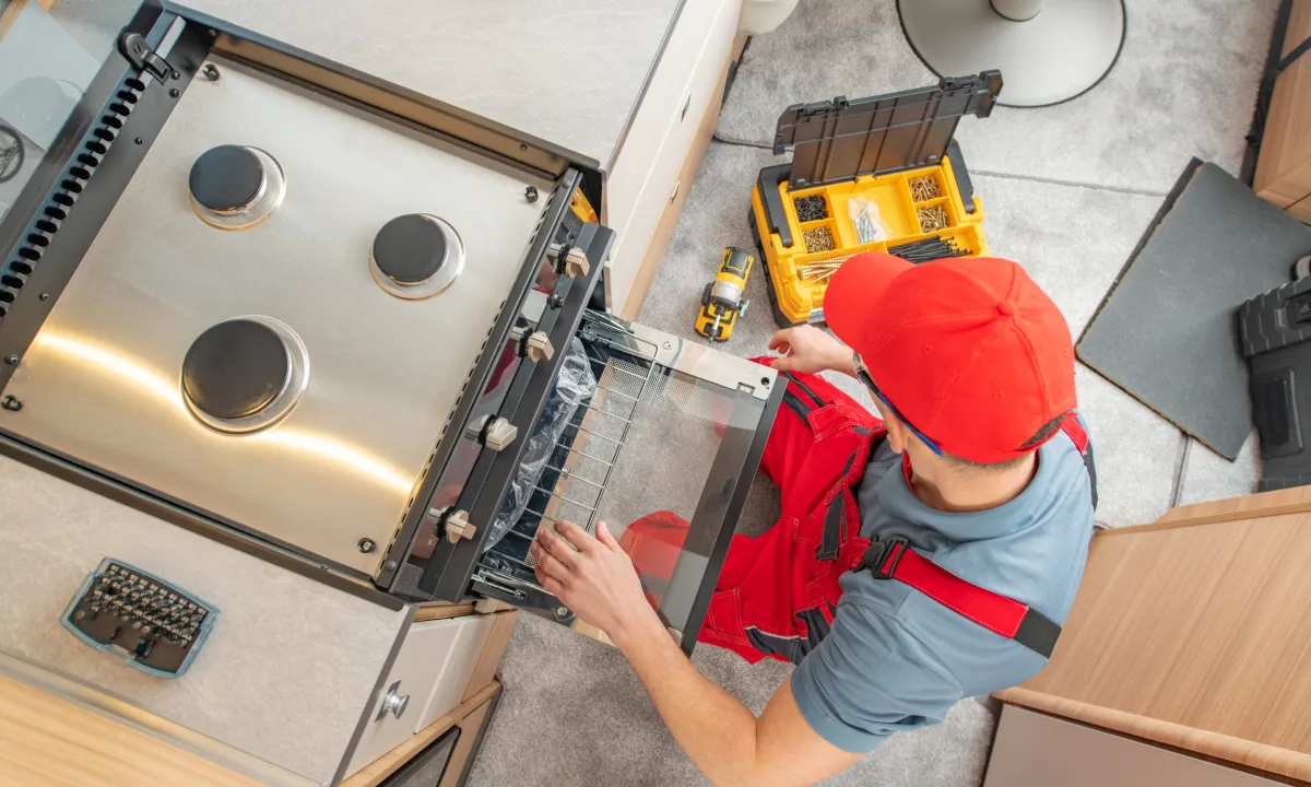 Technician installing a brand new stove in Alexandria, VA – Fast Service