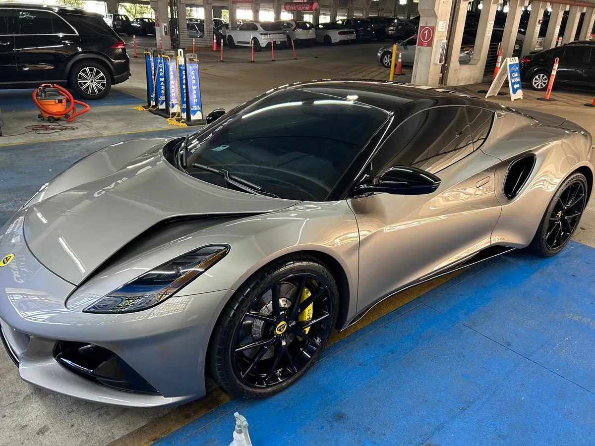 Silver Lotus Emira after a wash at MarMax Auto Spa