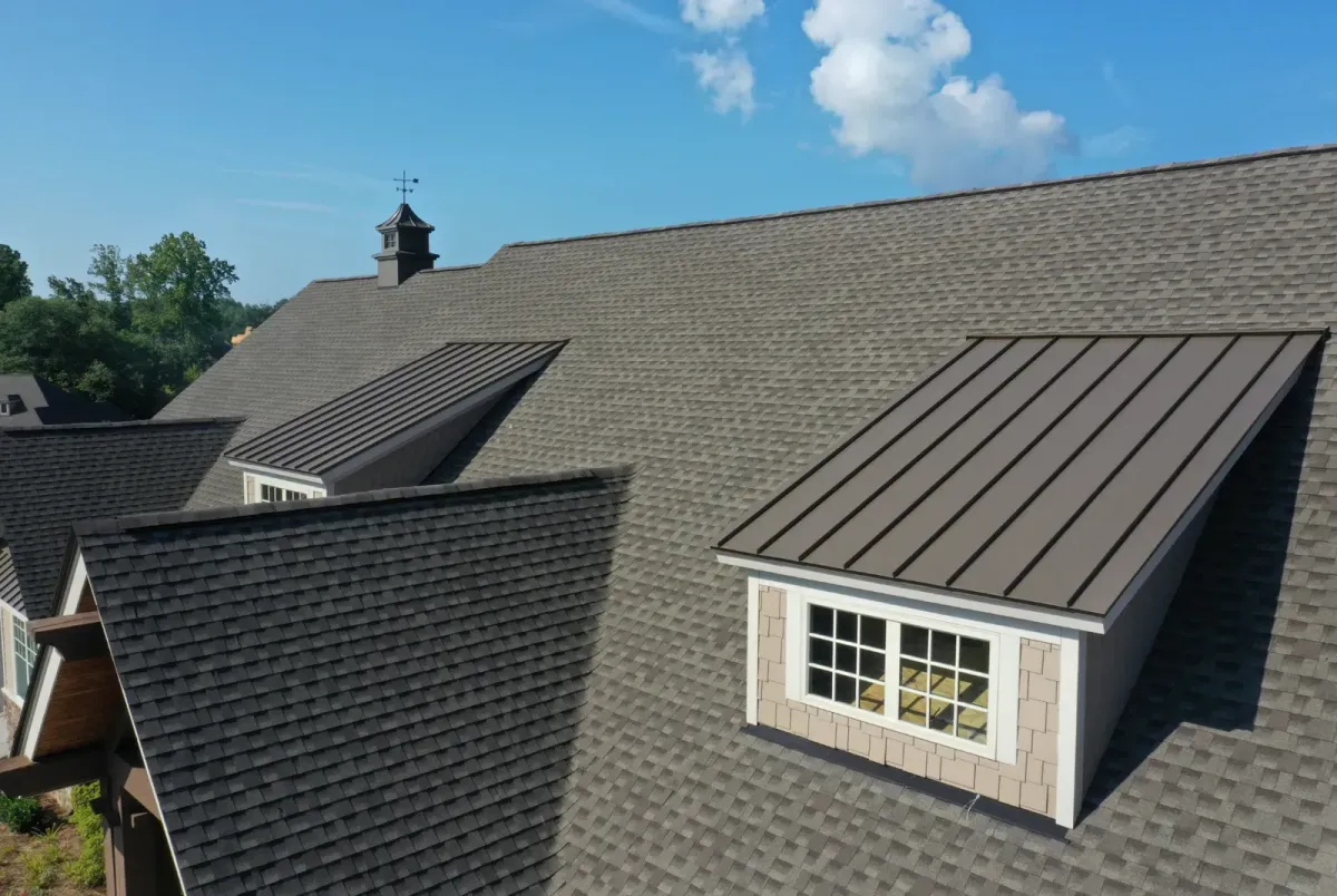 Professional metal roof installation on a residential home in Lynn, MA for long-lasting weather protection.