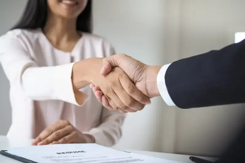 two people shaking hands