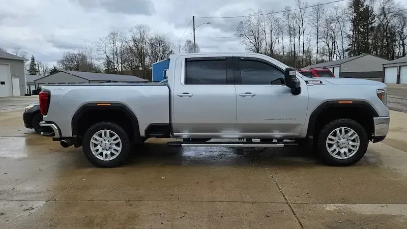 Restored silver truck after certified collision and body repair at Legacy Automotive in Hastings, MI