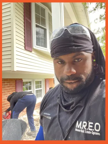 a pile of boxes sitting next to a radiator
