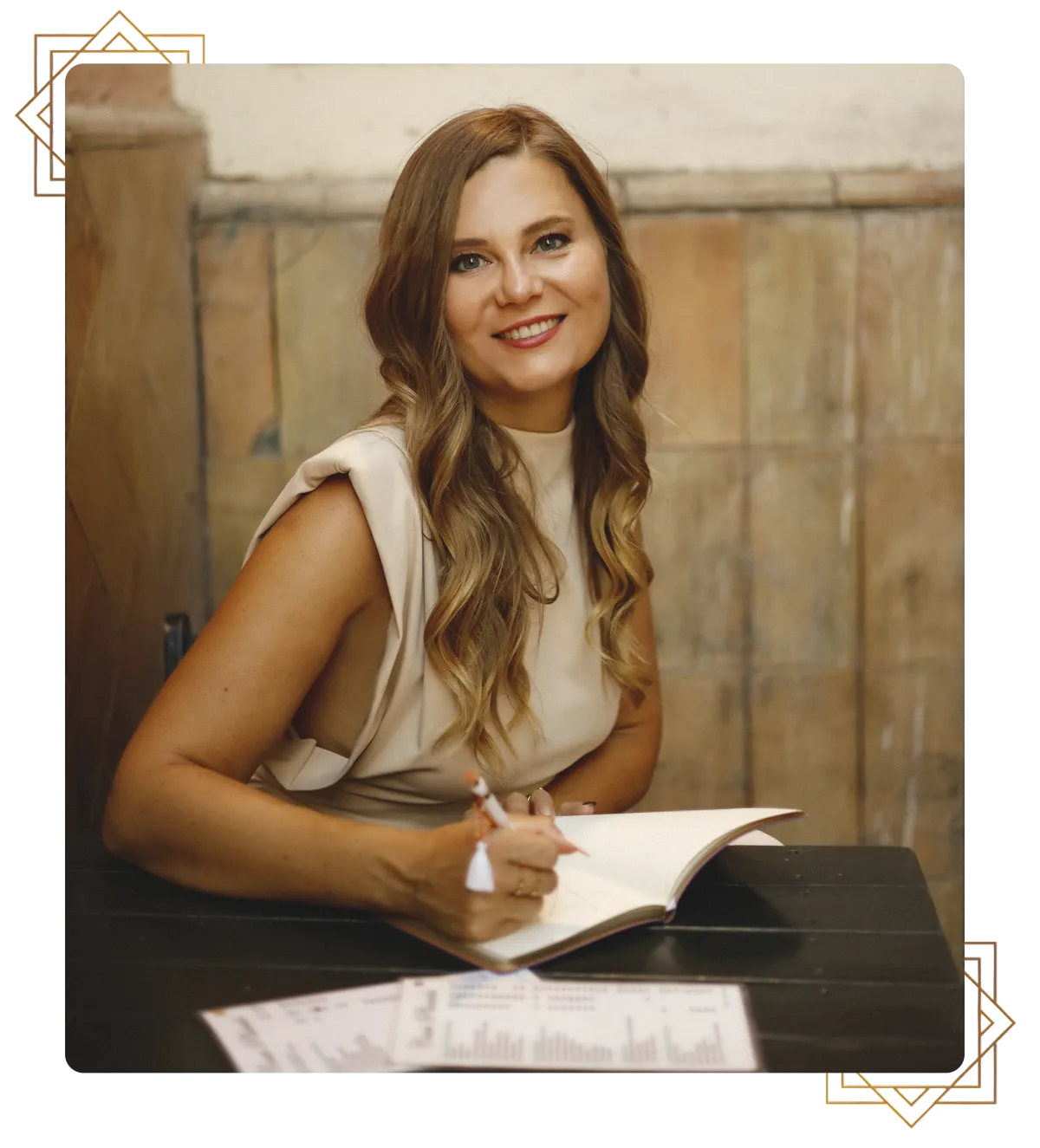 Eva Alexandre writing in a notebook during a strategy session for established consultants seeking business realignment.