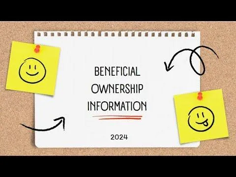 a cell phone next to a laptop