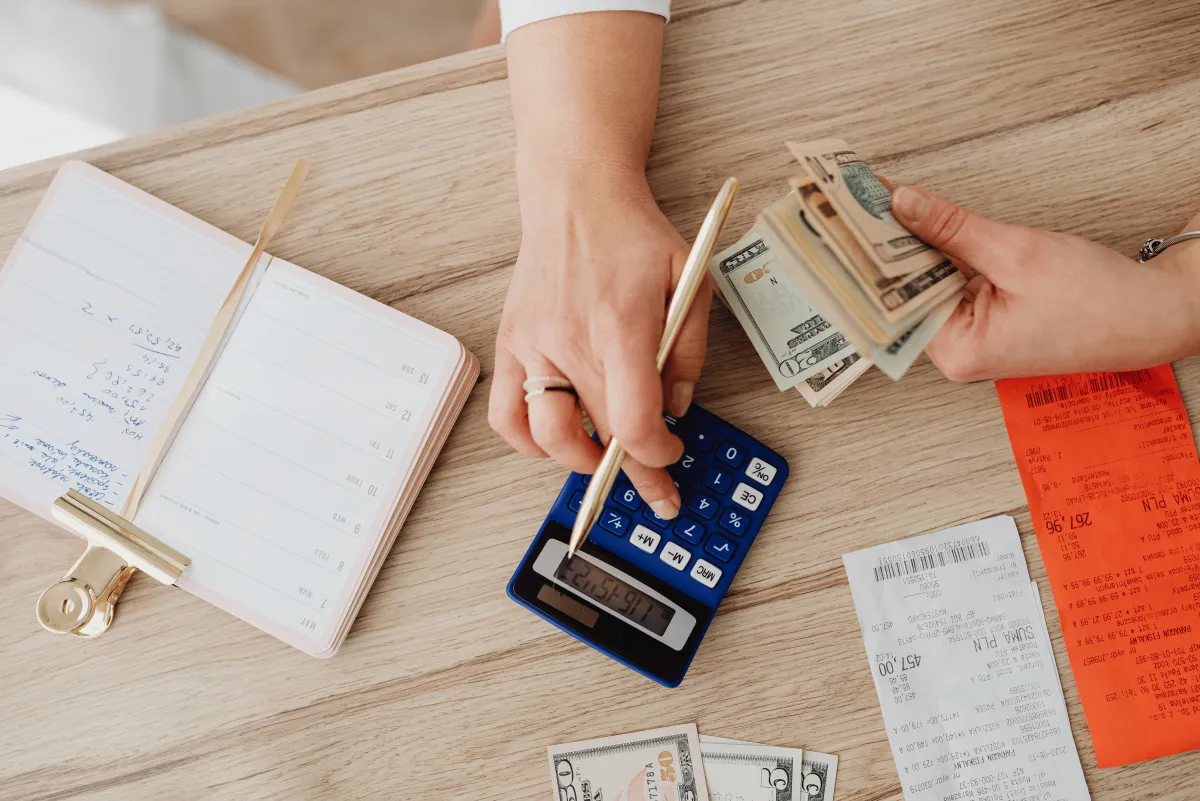 a pile of foreign currency sitting on top of a table