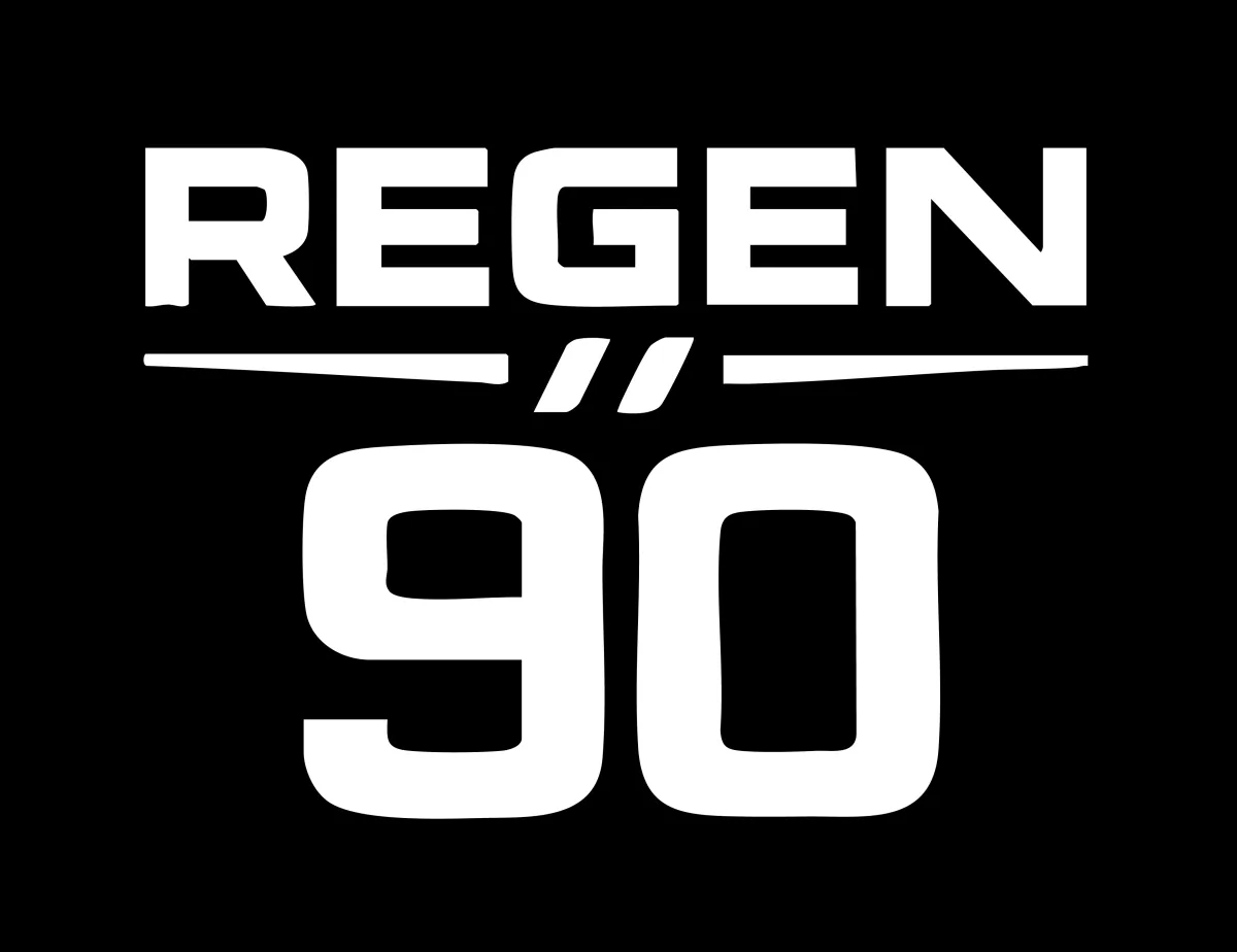 a gorilla sitting on top of a lush green field