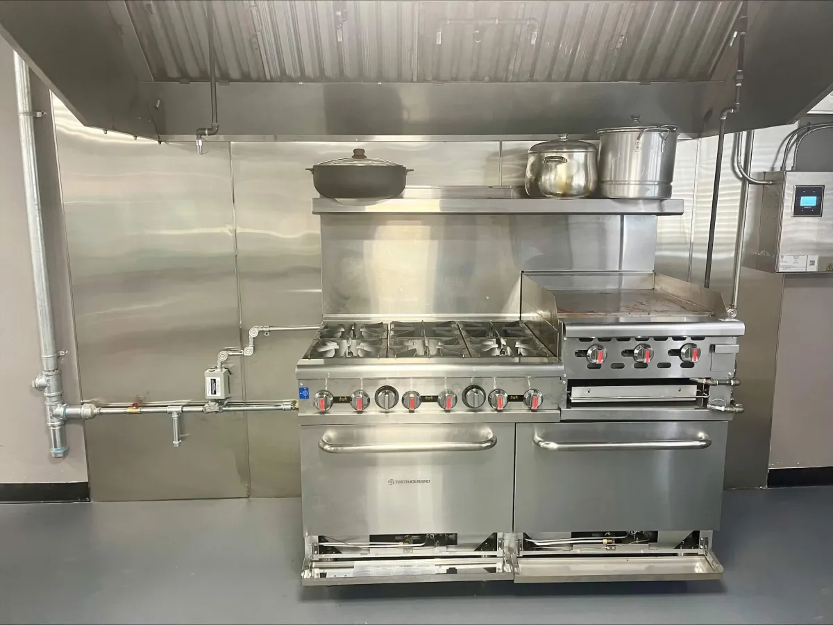 stainless steel cooking pots on stove