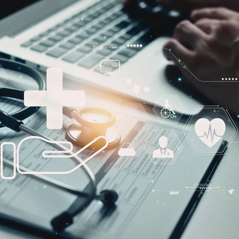 Medical professional reviewing health data on laptop representing personalized cellular wellness consultation, immune system balance support, and whole-body vitality with Biocell Human Ultracell Therapy.