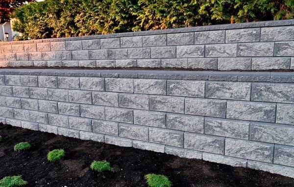 Custom block landscape retaining wall with tiers in Durham NC