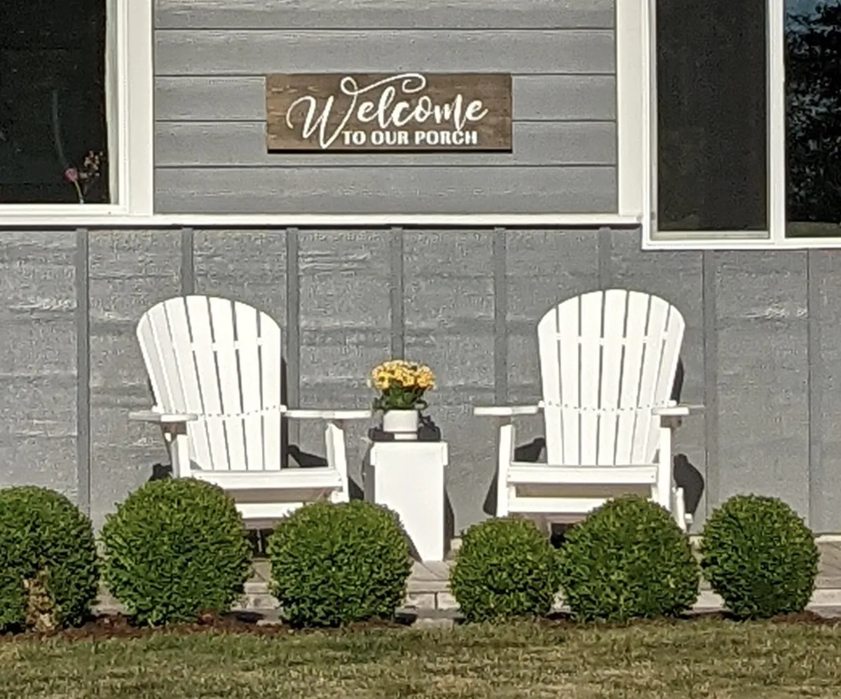 Two porch chairs waiting for the next chapter