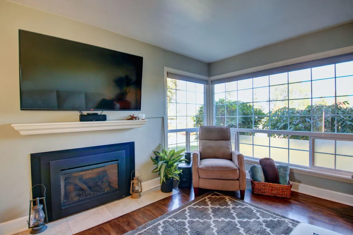 Cozy living room with fireplace in an Anacortes home