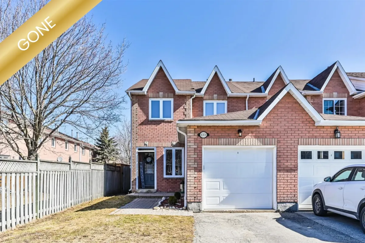 Modern residential living room at 133 Howard Cres, Orangeville, Ontario, showcasing a bright and open concept layout.