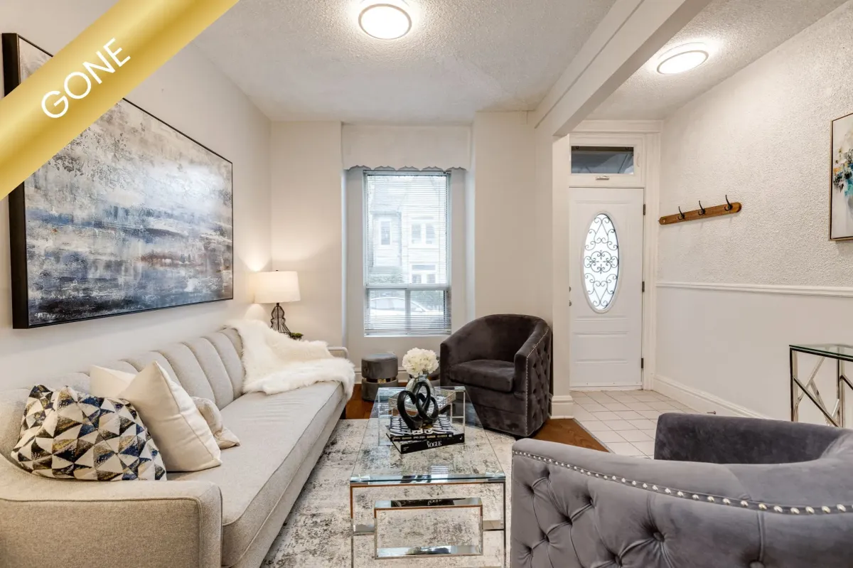 Beautifully staged residential interior at 56 Hickson Ave, Toronto, featuring modern geometric wall art and an open-concept layout.