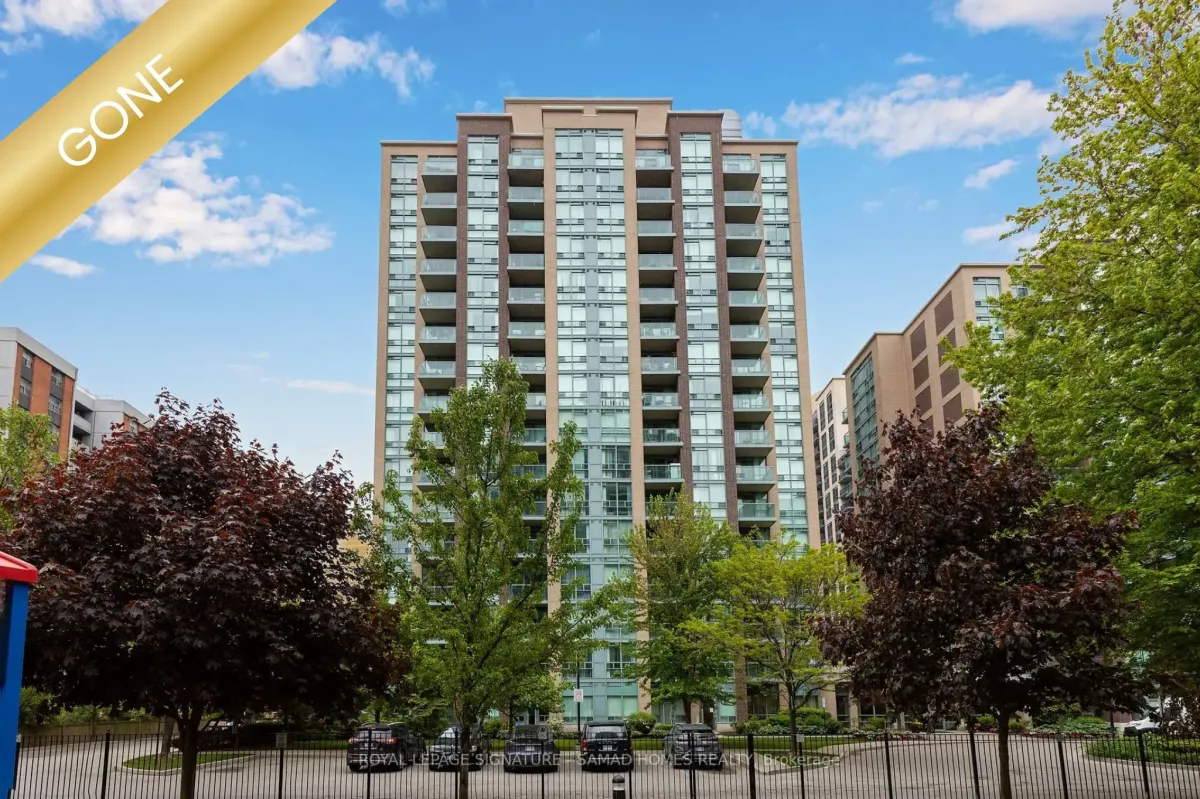 Modern kitchen and open-concept living space in a residential condo at 7 Michael Power Pl #LPH04, Toronto, Ontario.