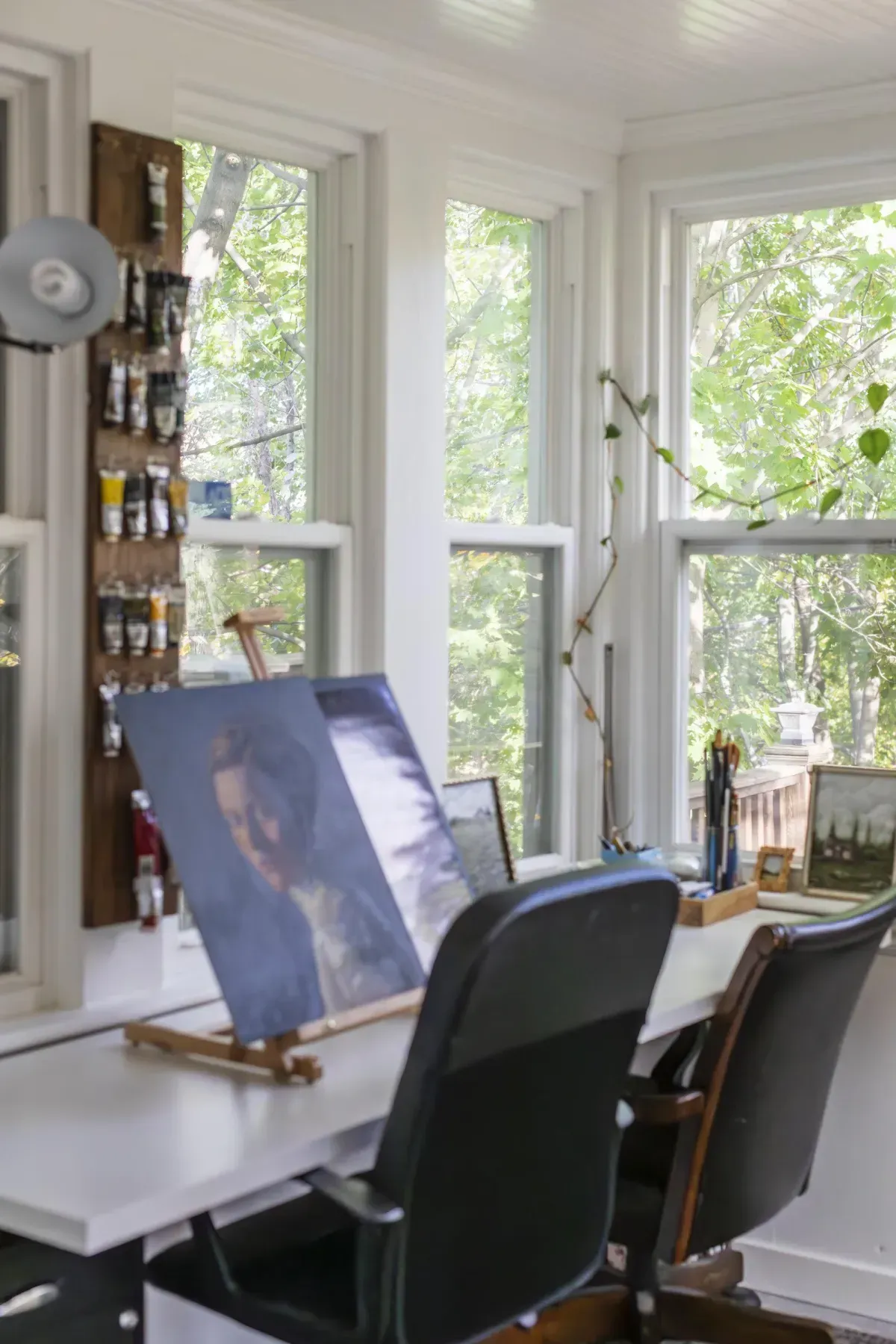 Dedicated home office at 109 Fairleigh Ave S, featuring bright windows—perfect for remote work.